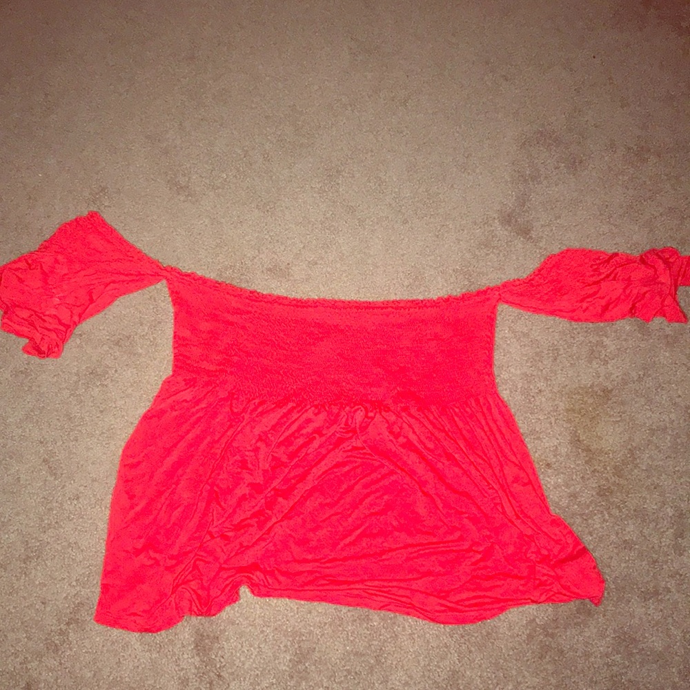 Off the shoulder red shirt